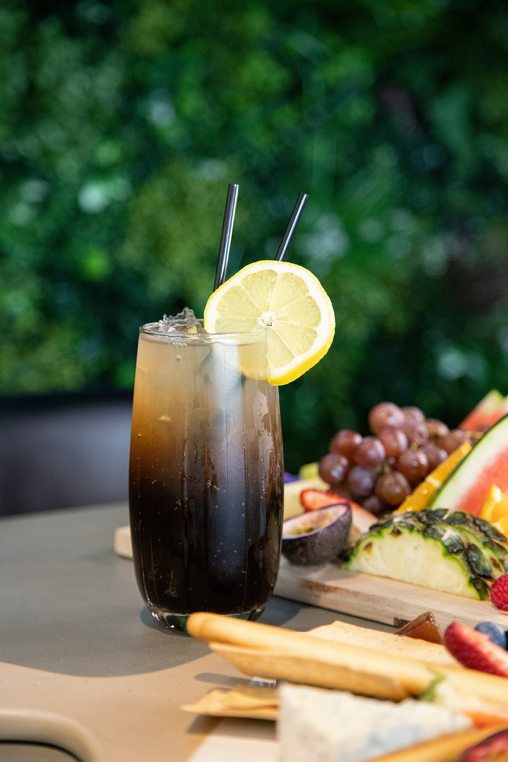 Tasmanian Iced Tea cocktail using Devil's Tongue in a tall glass with slice of lemon